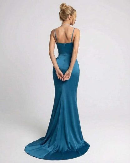 Back view of Laguna Maxi Dress by Lauven, showcasing the sleek teal fabric and elegant silhouette.