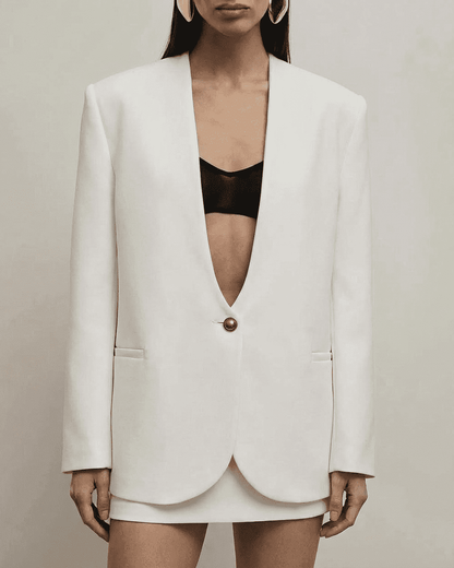 Alba Blazer by Lauven, women's tailored white blazer with deep V-neck and single-breasted design.