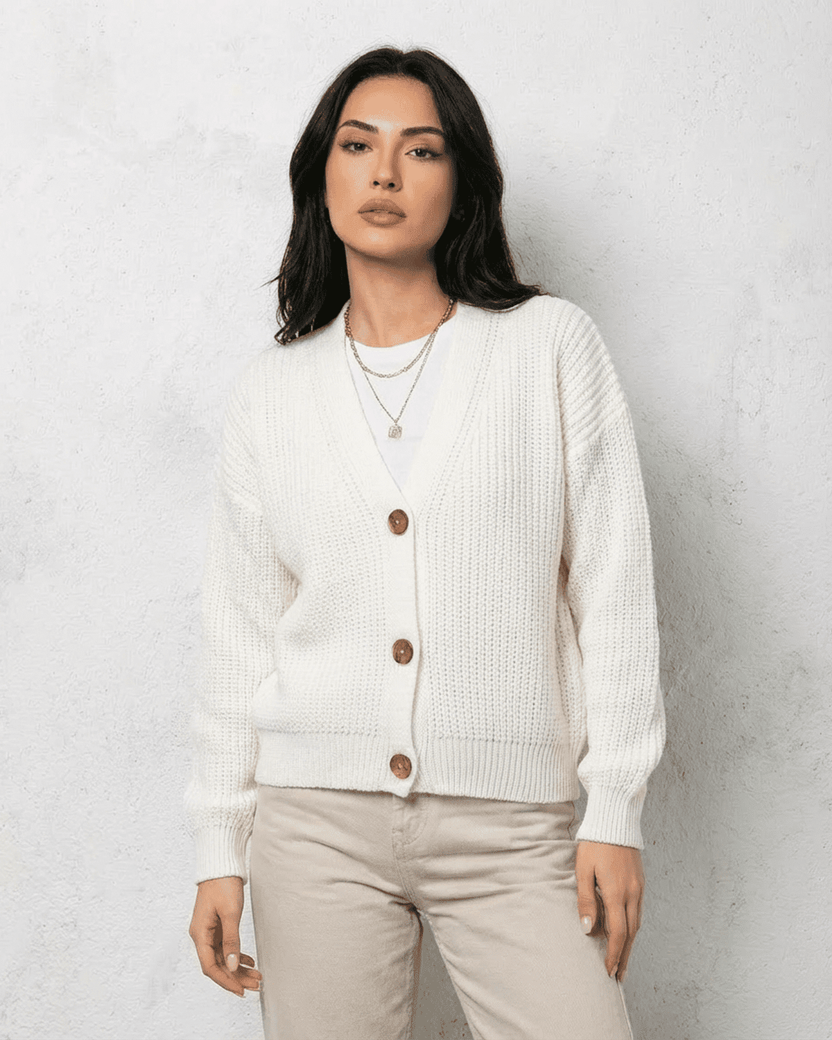 Alba Cardigan by Lauven, classic white knitwear with a soft V-neck and button detail.