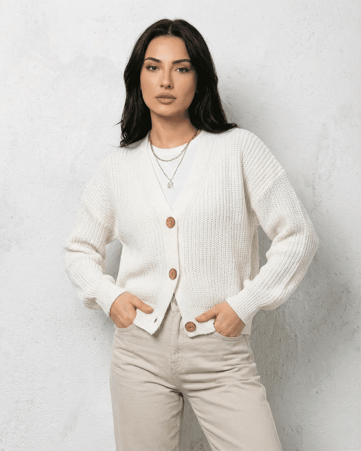 Alba Cardigan by Lauven - Classic white knitwear with V-neck and button details, perfect for layering.