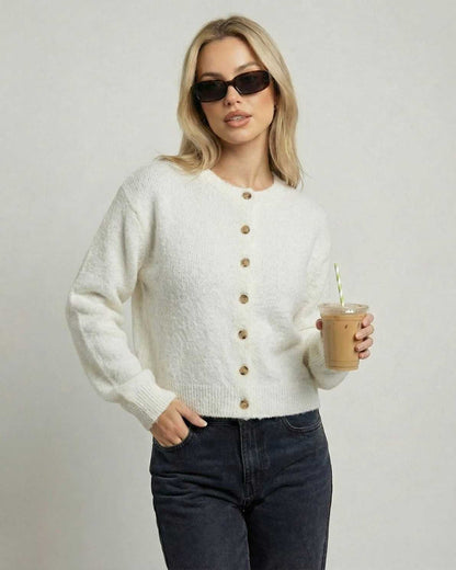 Alba Cardigan by Lauven, ivory button-front knit cardigan worn with sunglasses and iced coffee.