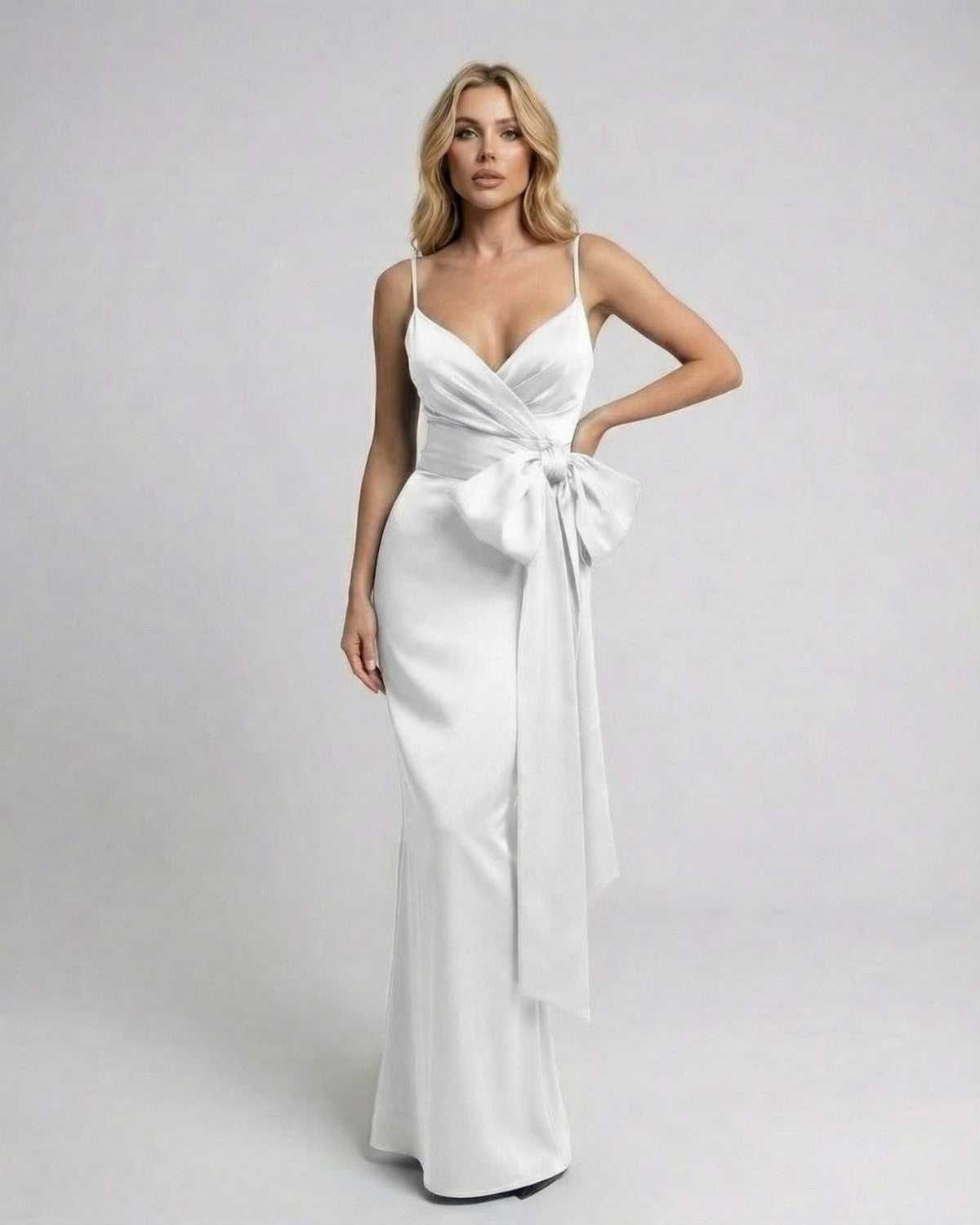 Lauven Alba Maxi Dress - Asymmetrical sleeveless dress with oversized bow detail in solid white.