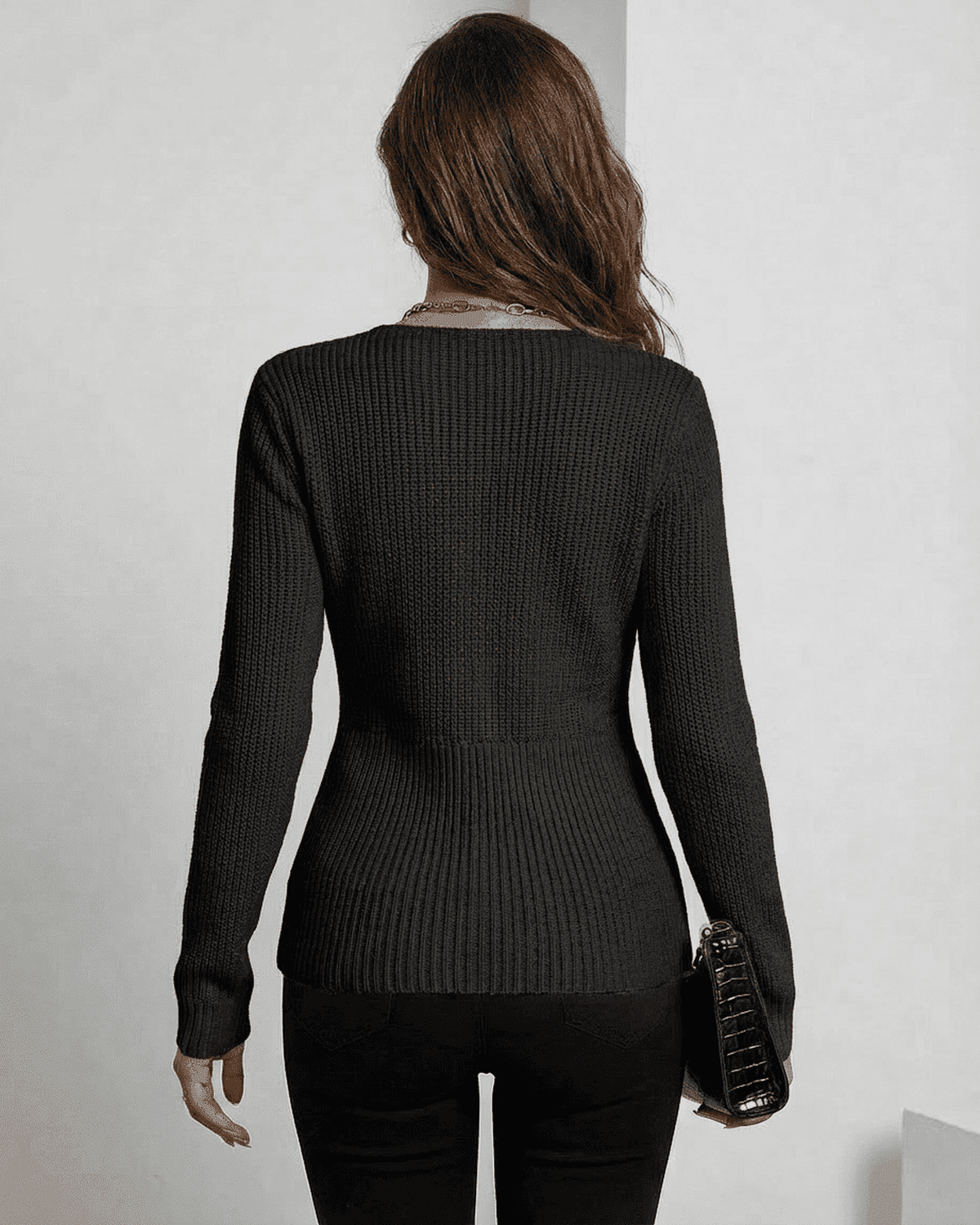 Alina Pullover by Lauven, sleek ribbed V-neck sweater in elegant black, showcasing a flattering silhouette from the back.
