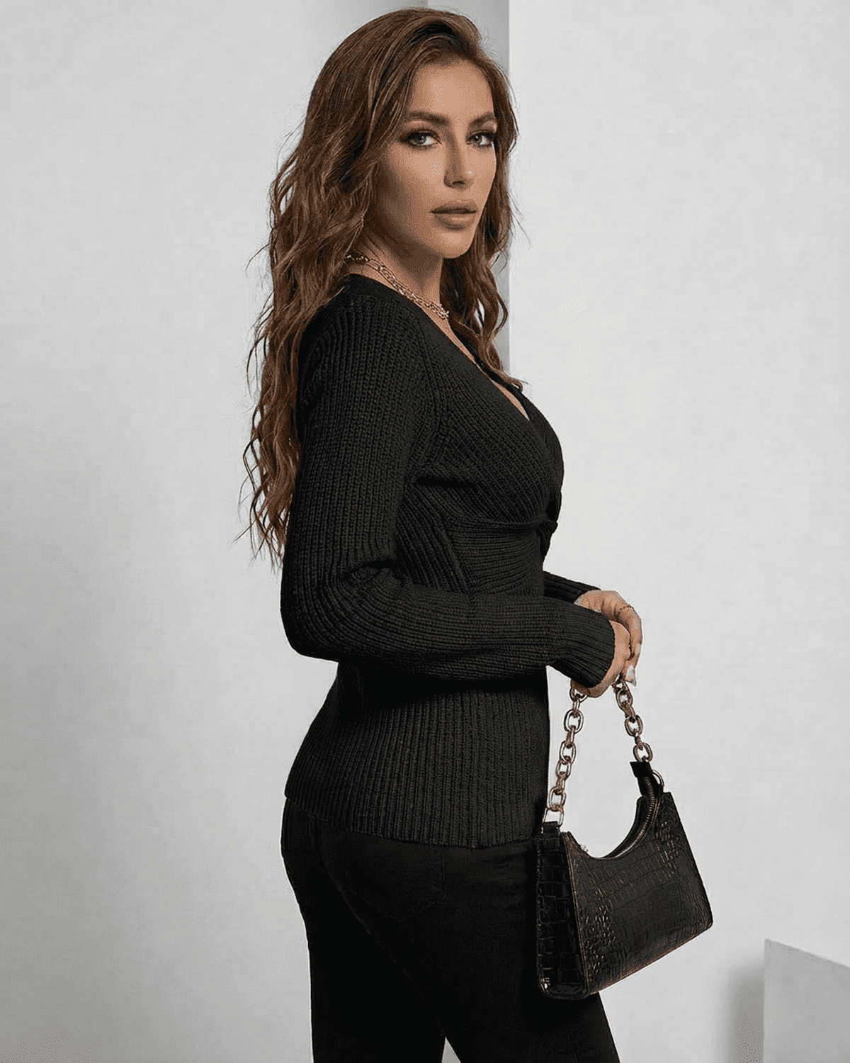 Alina Pullover by Lauven, elegant ribbed slim fit V-neck sweater in black, showcasing a sophisticated silhouette.