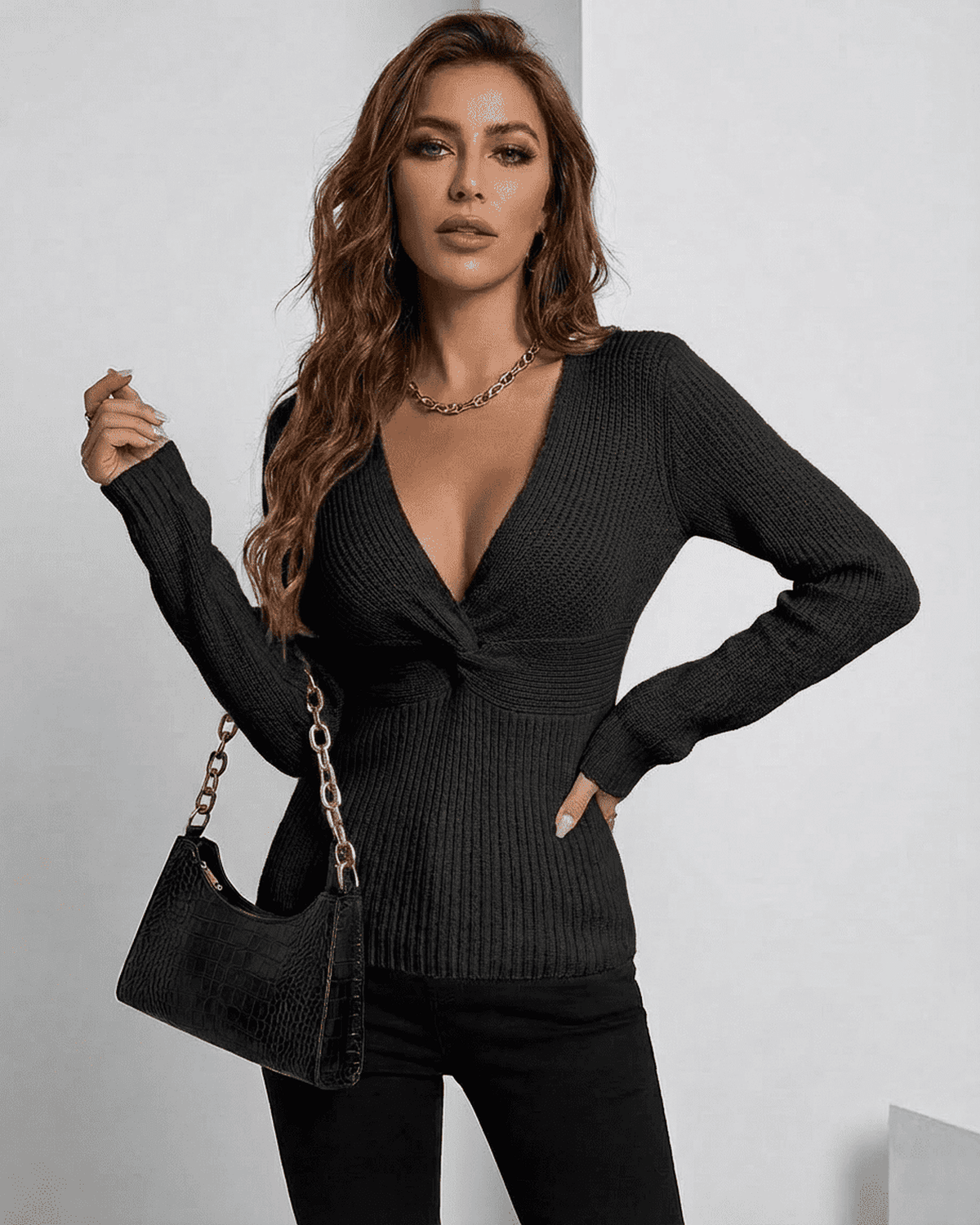 Alina Pullover by Lauven - Elegant black ribbed slim fit V-neck sweater worn with a stylish handbag.