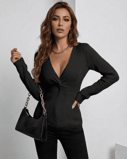 Alina Pullover by Lauven - Elegant black ribbed slim fit V-neck sweater worn with a stylish handbag.