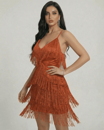 Amber Mini Dress by Lauven featuring fringe detailing and a V-neck silhouette in warm amber tone.