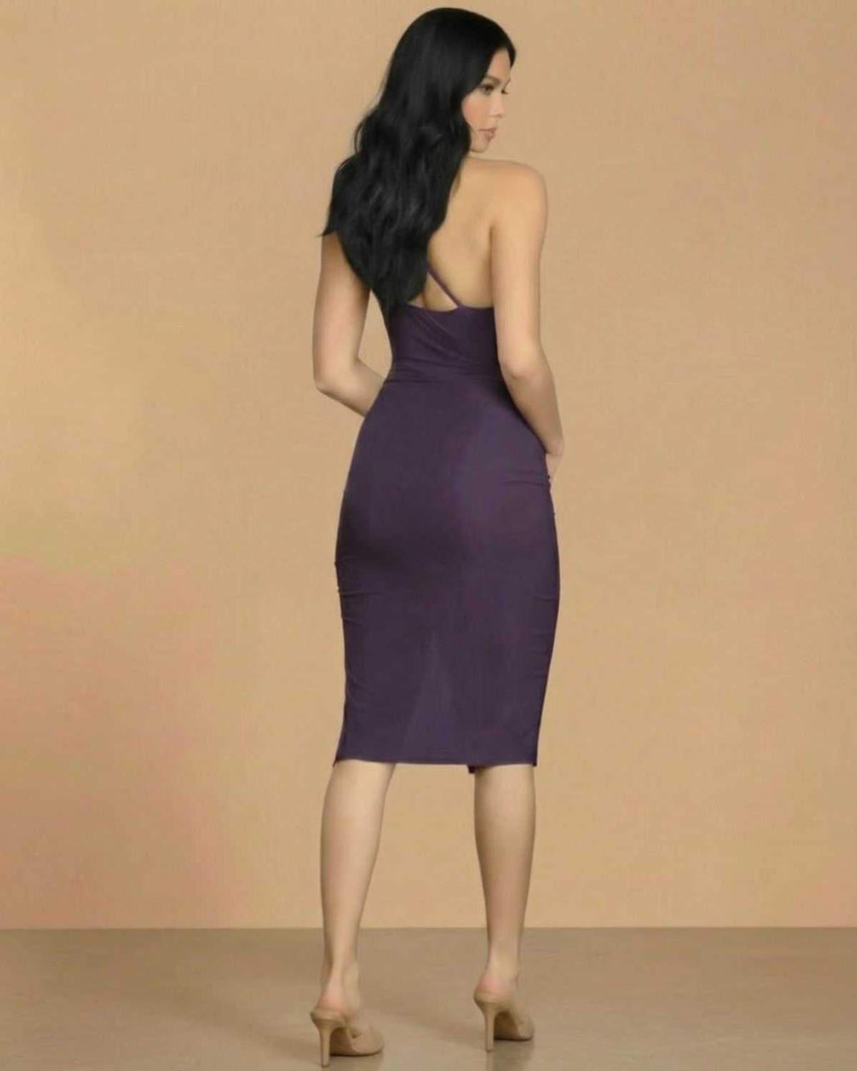 Amethyst Midi Dress by Lauven, showcasing a sleek bodycon fit and cowl neck detail from the back.