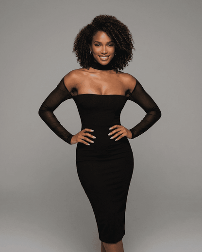 Arden Midi Dress by Lauven showcasing a stunning model in a bodycon cutout long sleeve black dress.