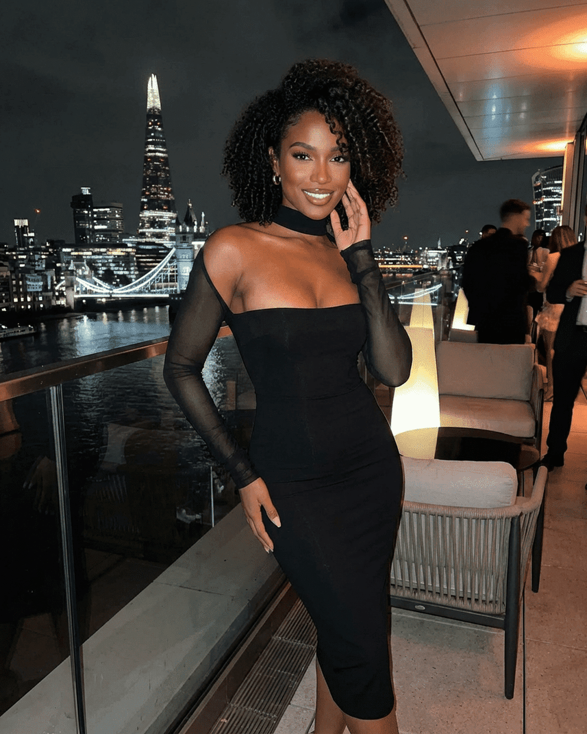 Arden Midi Dress by Lauven - Elegant black bodycon style with cutout design and long sleeves, perfect for evening events.