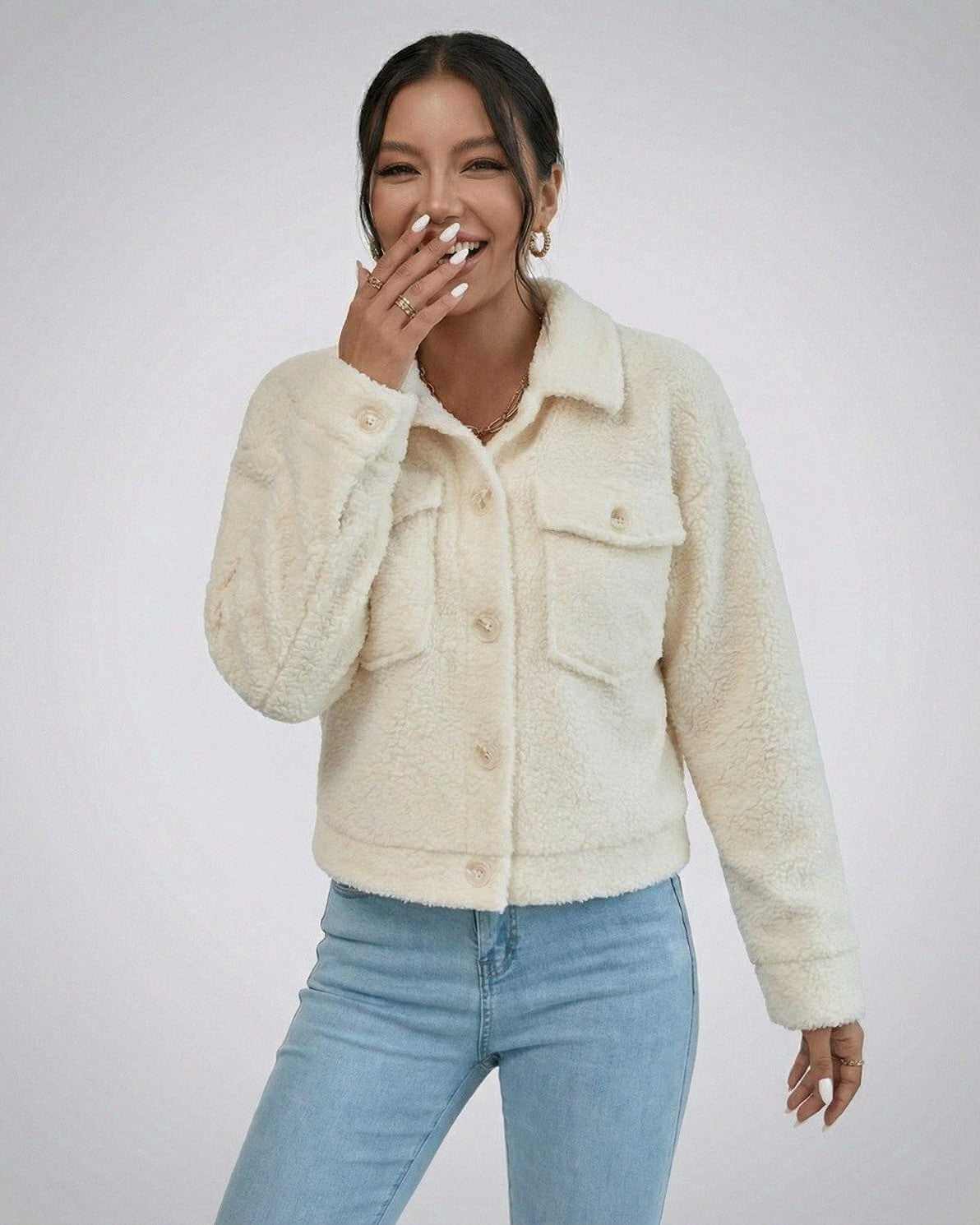 Aspen Jacket by Lauven, a women's faux fur jacket with lapel collar for stylish cold-weather layering.