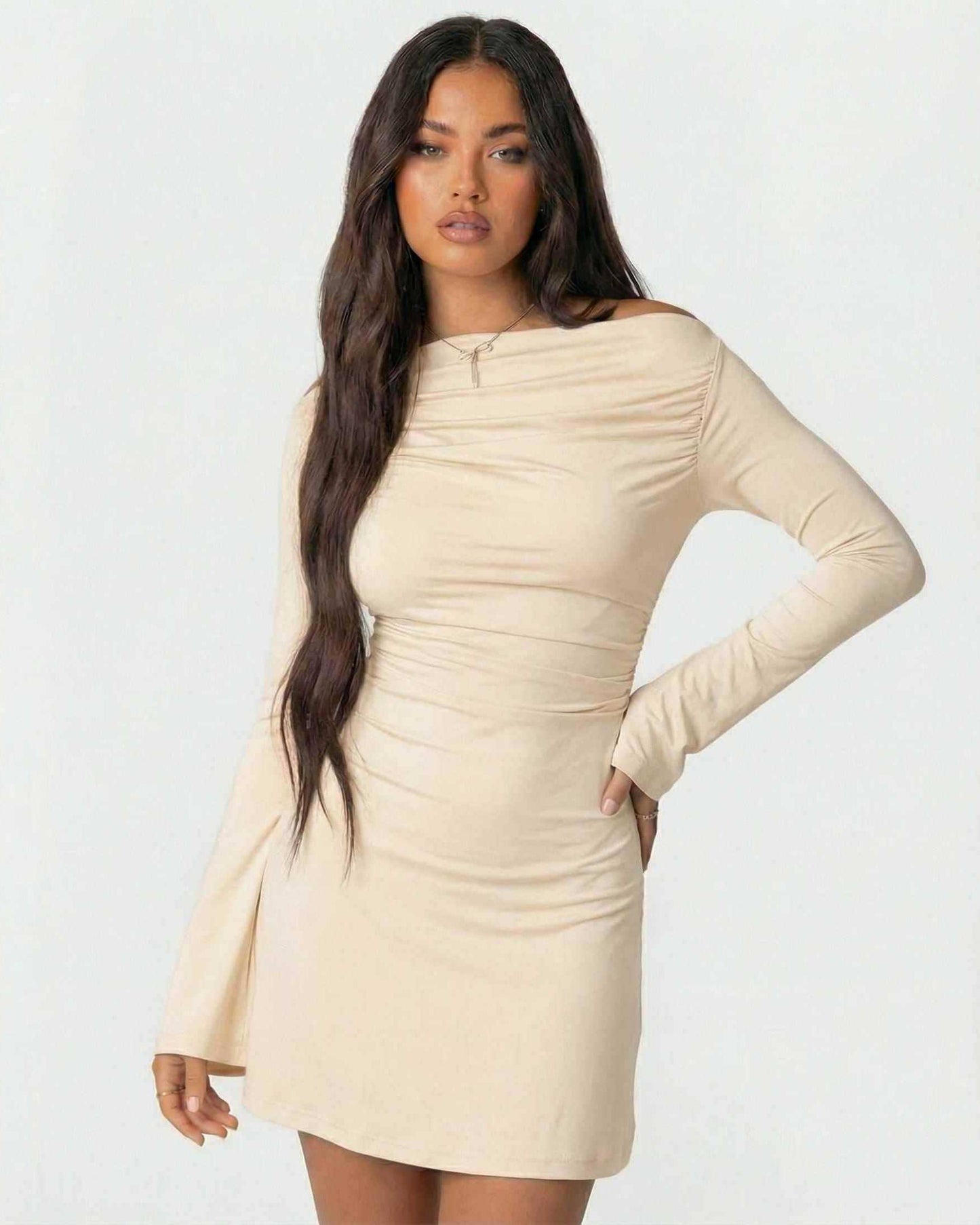 Aurelia Mini Dress by Lauven with asymmetrical neckline and long sleeve pencil silhouette in soft cream.