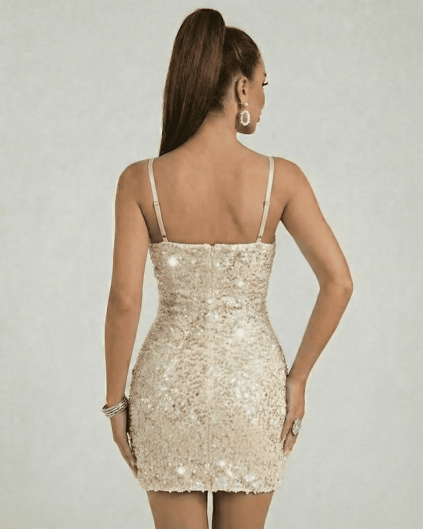 Aurelia Sequin Dress by Lauven - Back view of mini bodycon silhouette with champagne sequins.
