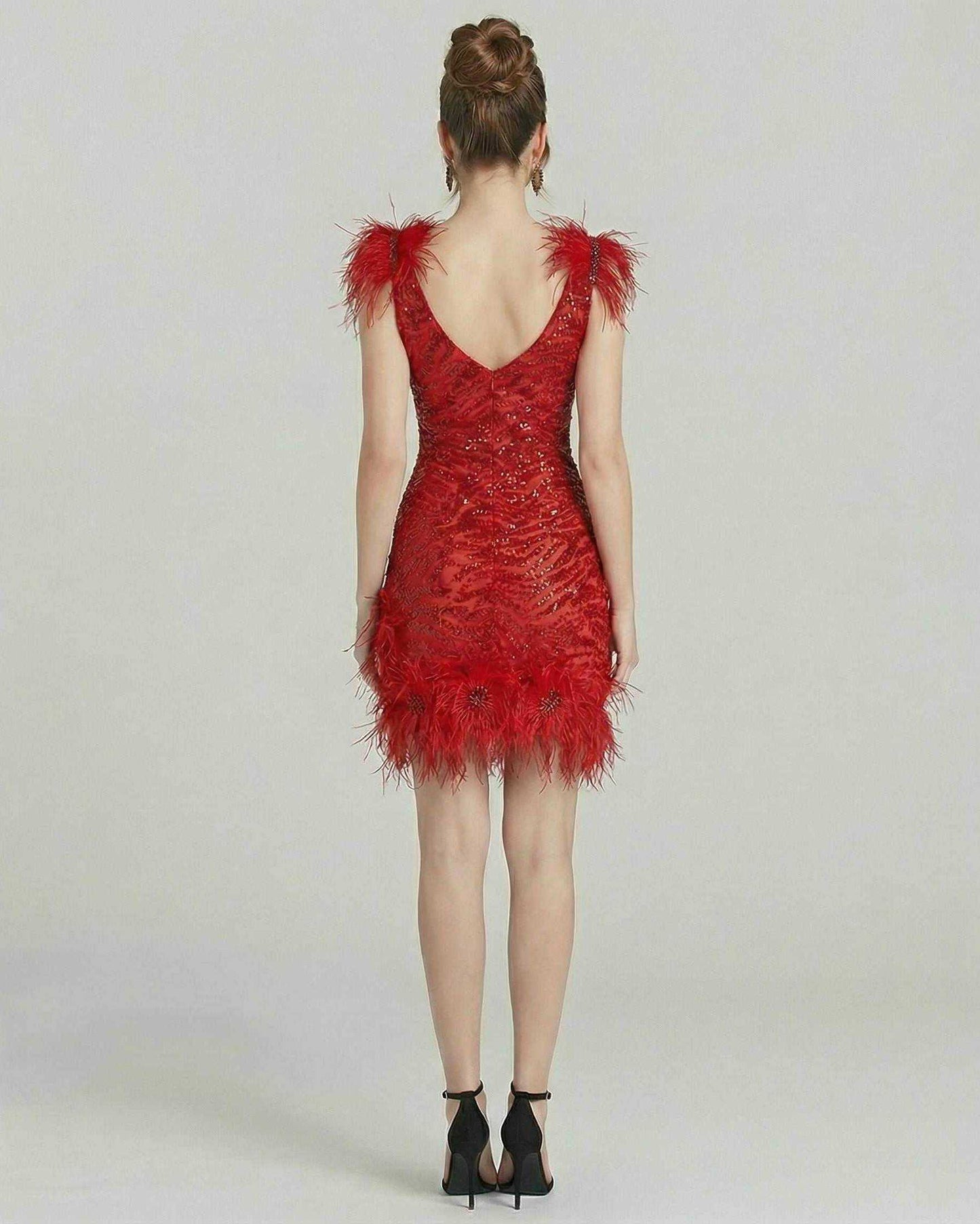 Aurora Mini Dress by Lauven featuring feathered accents and sequin embellishments in vibrant red.