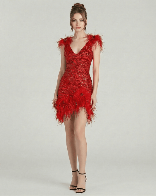 Aurora Mini Dress by Lauven featuring feathered accents and sequin embellishments in vibrant red.