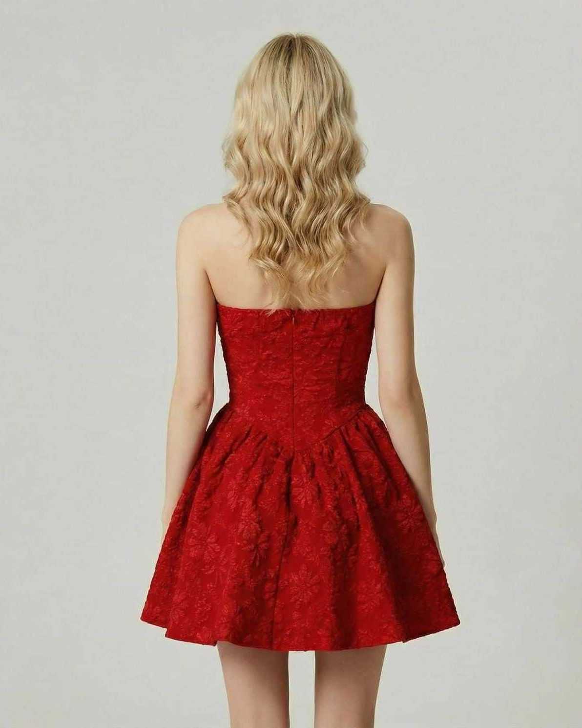 Back view of the luxurious Lauven Aurora Mini Dress in red floral jacquard with a high waist skirt.