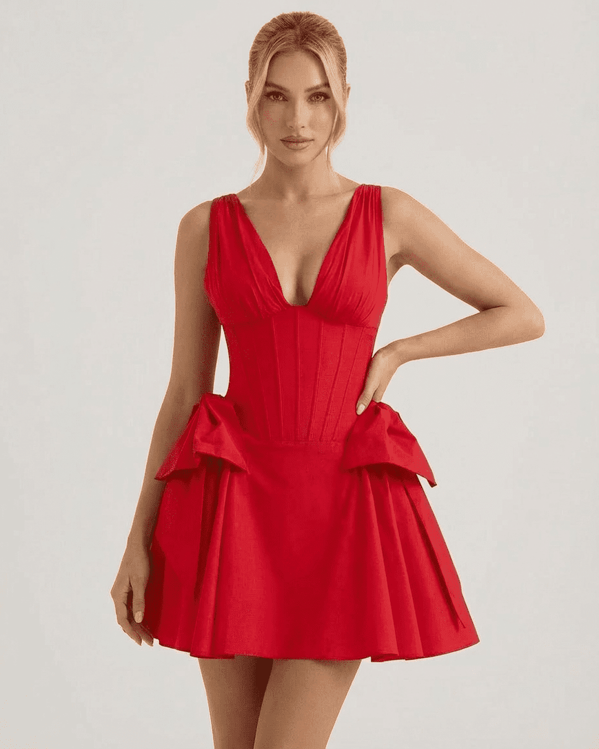 Aurora Mini Dress by Lauven in striking red with a V-neck corset bodice and pouf skirt.