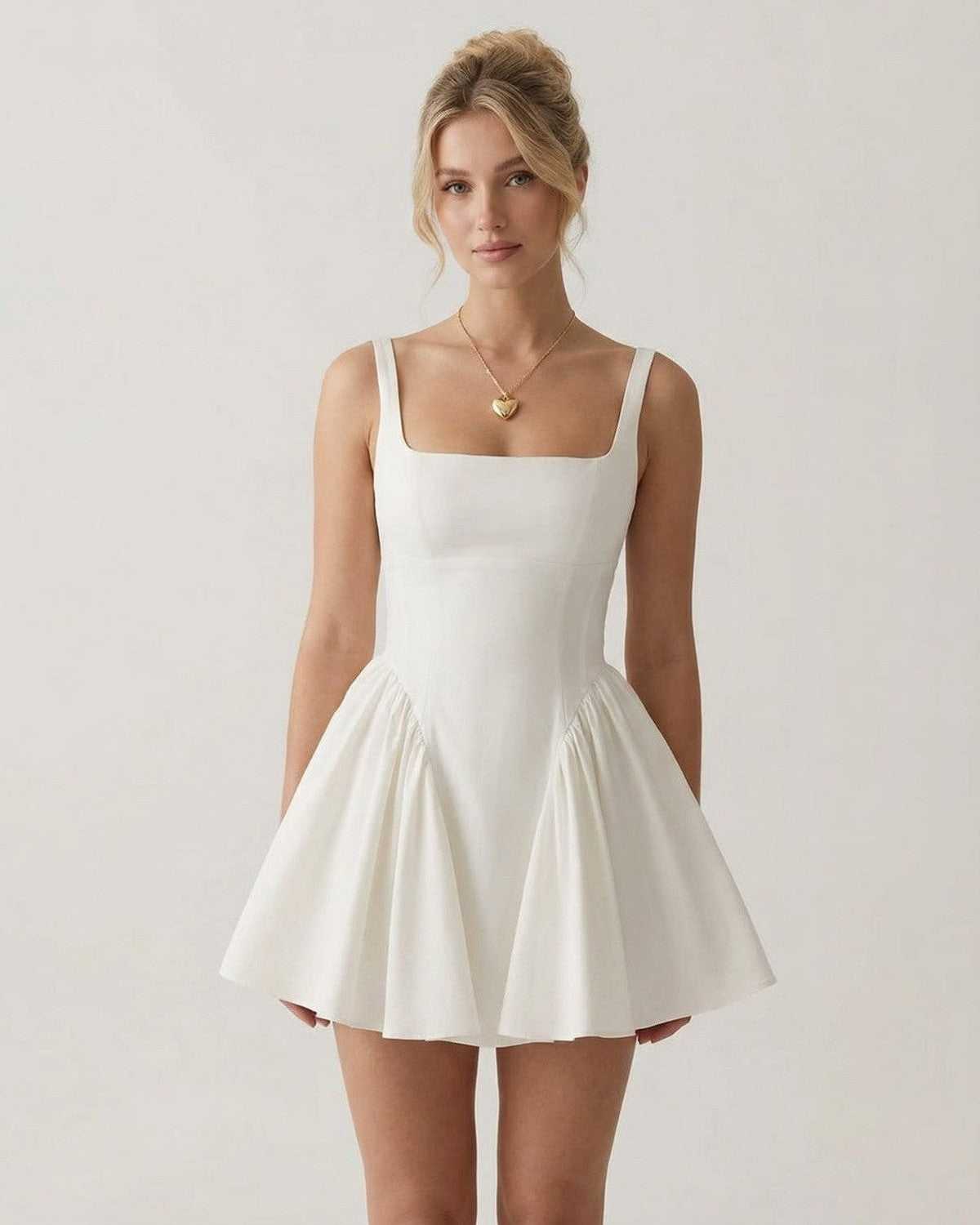 Aurora Mini Dress by Lauven, white square neck backless mini dress with bow detail and A-line shape.
