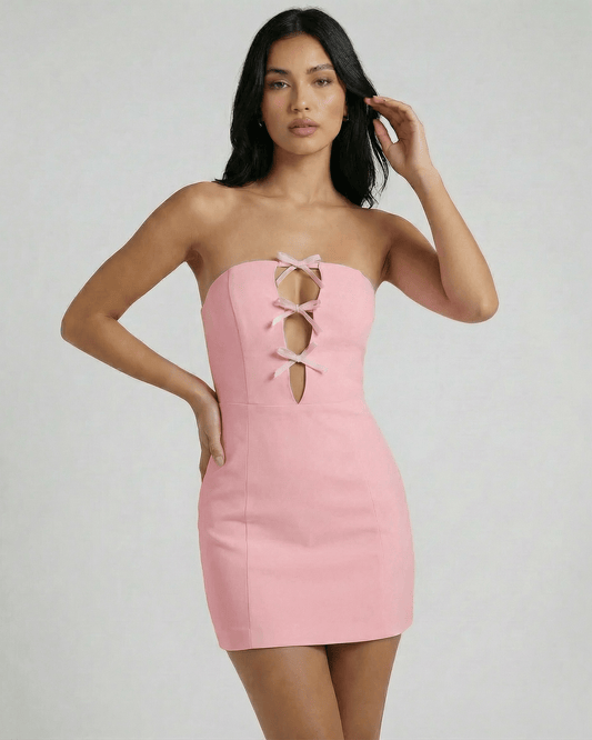 Aurora Mini Dress by Lauven, featuring a strapless design with bow details and a fitted silhouette in pink.