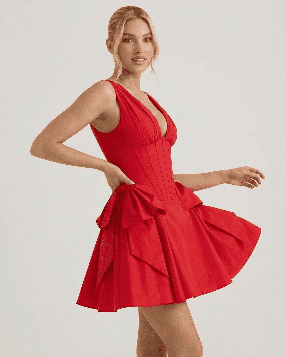Aurora Mini Dress by Lauven in red, showcasing a V-neck corset design and pouf skirt for a stylish party look.