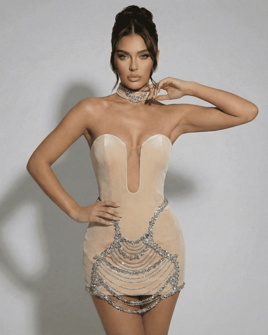 Aurora Mini Dress by Lauven – Velvet bodycon mini dress with rhinestone chain detail, featuring a deep V-neckline.