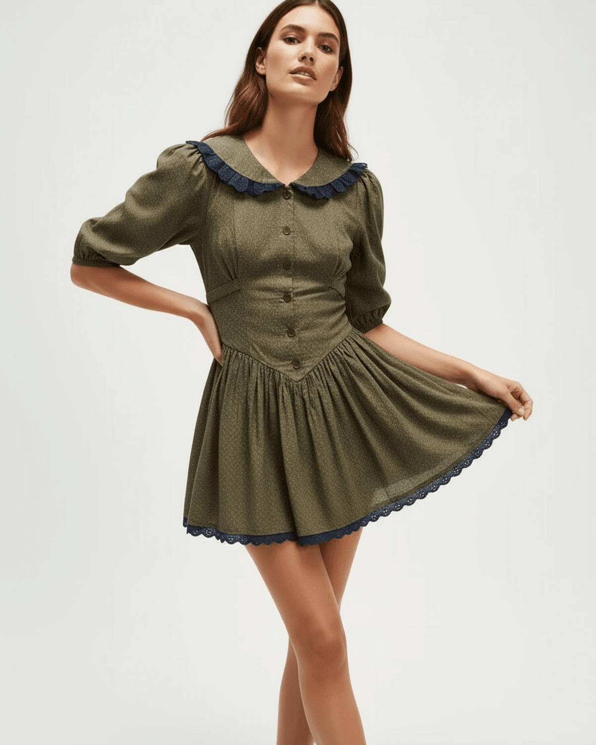 Aveline Mini Dress by Lauven, featuring a Peter Pan collar, puff sleeves, and a slim fit in olive green with navy details.