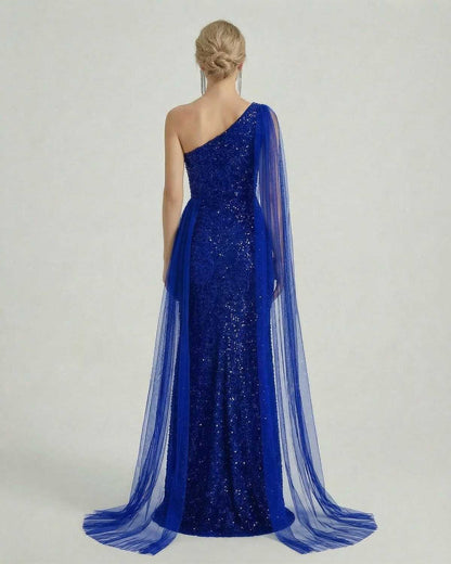 Azure Maxi Dress by Lauven featuring a one shoulder design and a sheer mesh drape, showcasing a sequined blue finish.