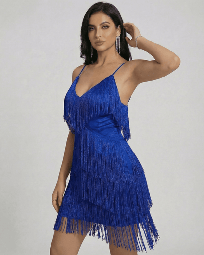 Model wearing the Azure Mini Dress by Lauven featuring layered fringe and a V-neck design.