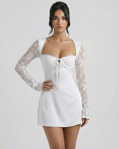 Bianca Mini Dress by Lauven, women’s white lace long sleeve mini dress with sculpted neckline and tie-front detail.