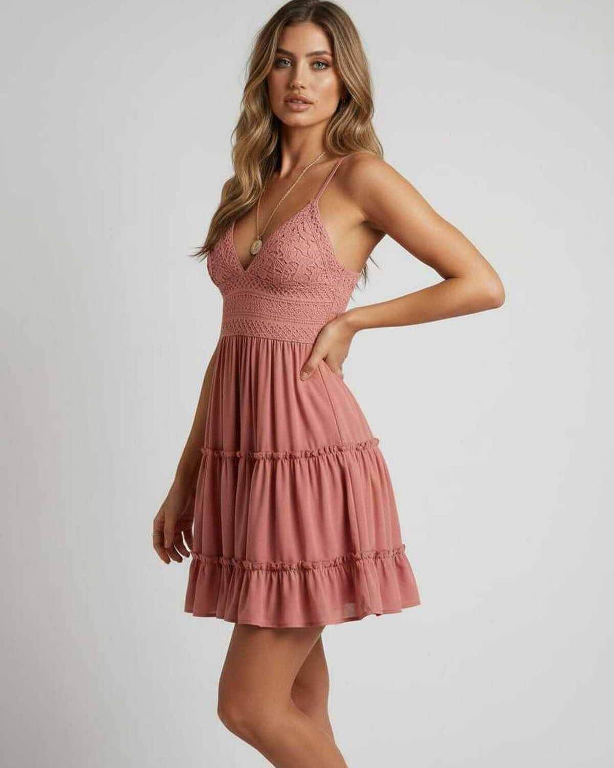 Lauven Blossom Mini Dress showcasing a sexy lace design with spaghetti straps and pleated skirt, perfect for parties.