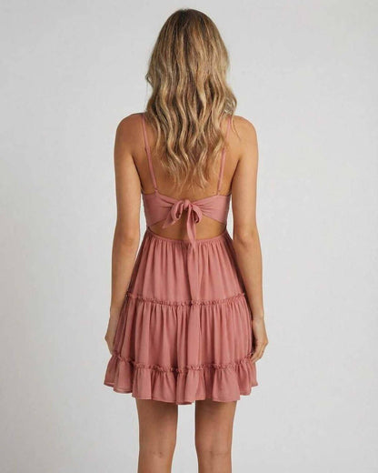 Lauven Blossom Mini Dress featuring a sexy lace design with a flared skirt and back tie detail.