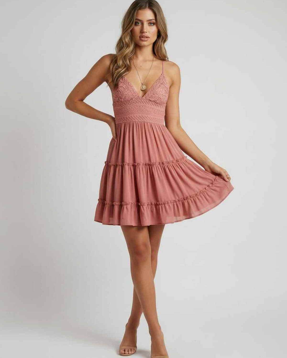 Blossom Mini Dress by Lauven, featuring lace details, spaghetti straps, and a flared skirt perfect for parties.