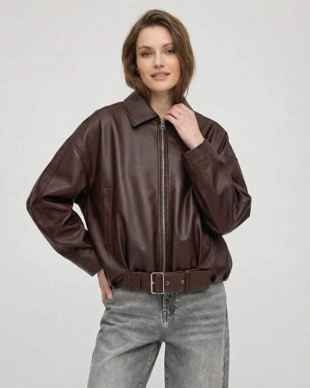Women wearing a Brown Belted Jacket by Lauven, showcasing oversized style with a structured lapel collar.