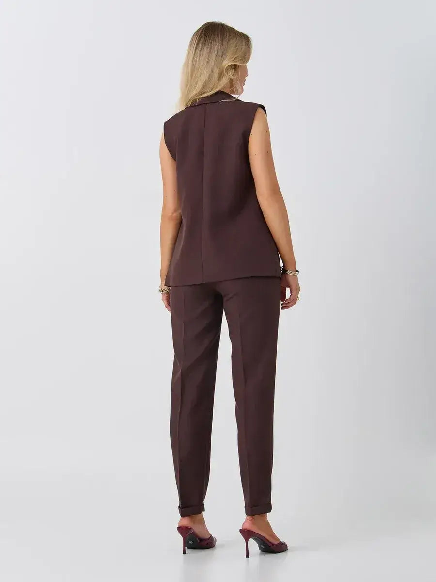 Cacao Suit Set by Lauven featuring a sleeveless chocolate vest and high-waist pants, ideal for modern women's fashion.