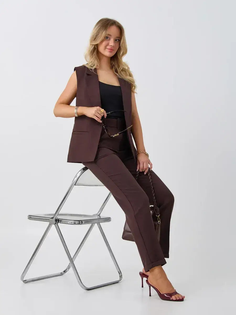 Cacao Suit Set by Lauven features a sleeveless chocolate vest and high-waist pants, showcasing modern women's fashion.