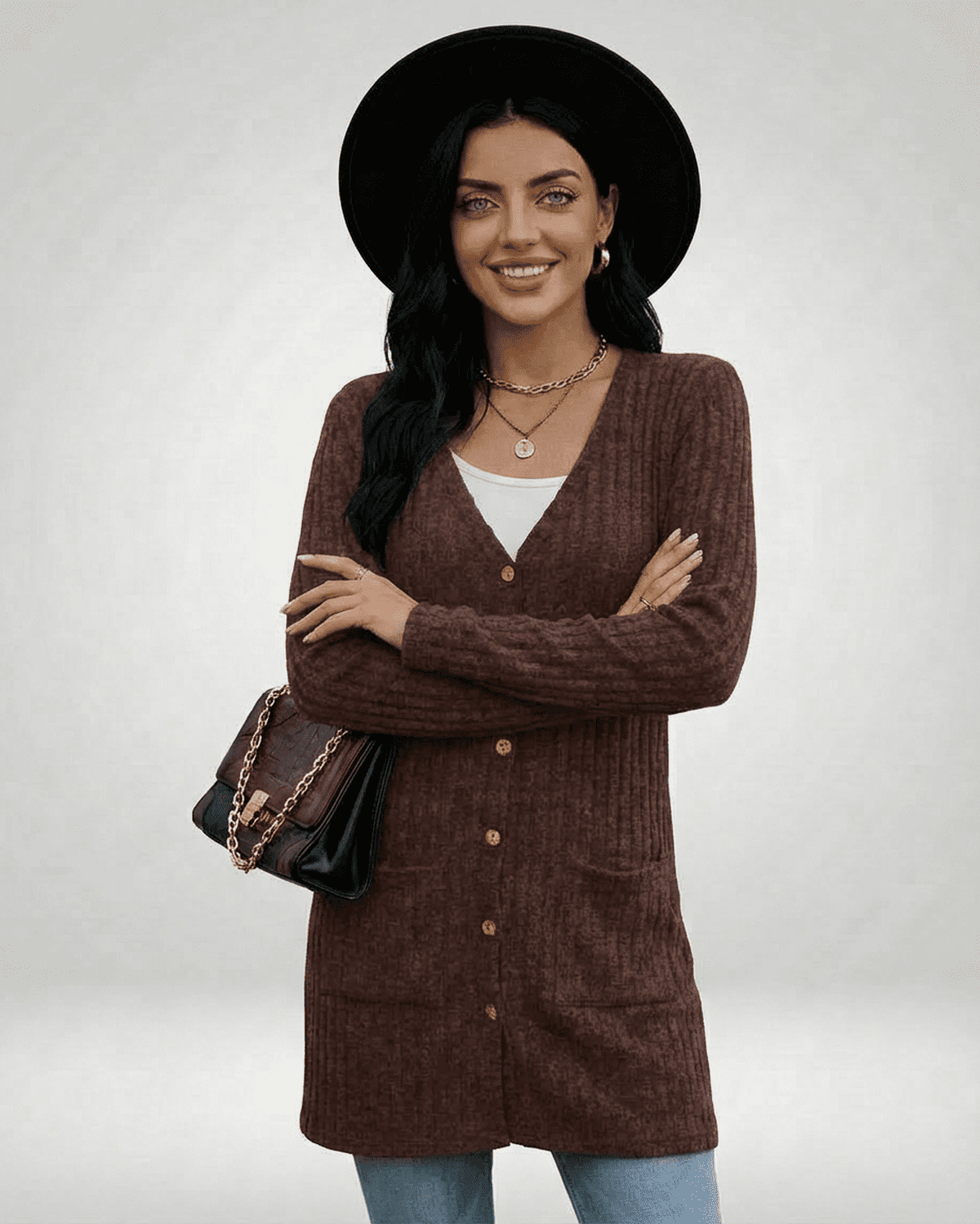Cairo Cardigan by Lauven, a longline button-front knitwear piece, featuring a classic V-neckline and soft texture.