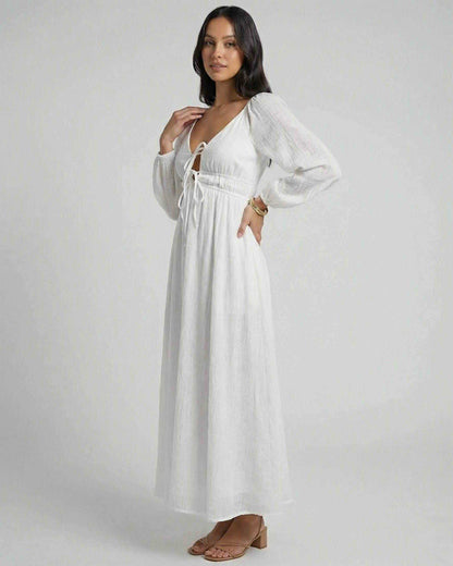 Calista Maxi Dress by Lauven showcases a V-neck empire waist, ankle-length silhouette, perfect for stylish spring looks.
