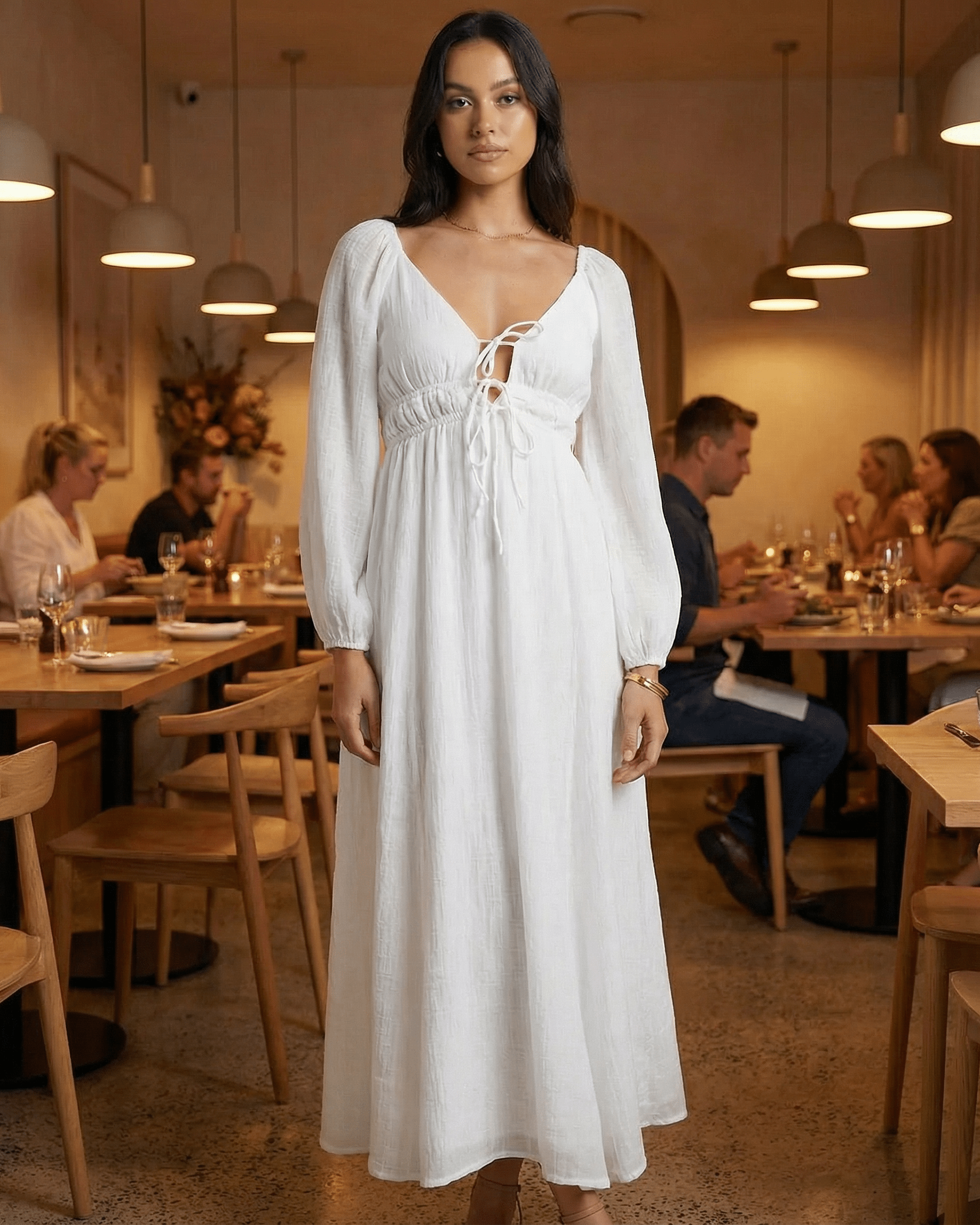 Calista Maxi Dress by Lauven, elegant white V-neck ankle-length dress styled in a restaurant setting.