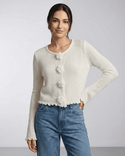 Camellia Cardigan by Lauven featuring floral button details and soft knit texture, perfect for elevated everyday styling.