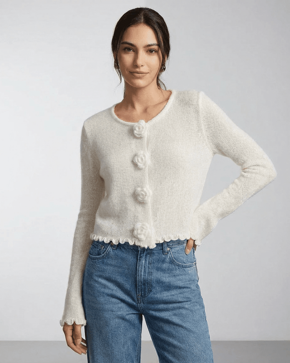 Camellia Cardigan by Lauven featuring floral button detailing and a soft knit texture.