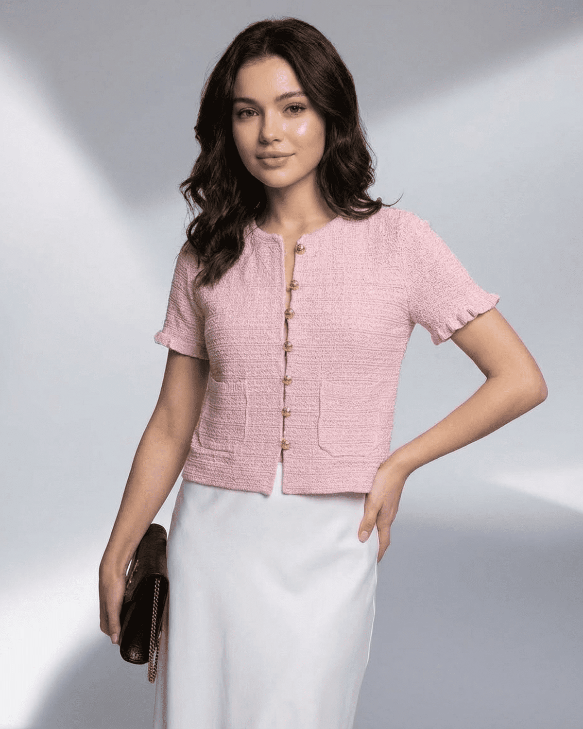 Women wearing Lauven Camellia Cardigan in pink, featuring short sleeves, button closure, and O-neck design.