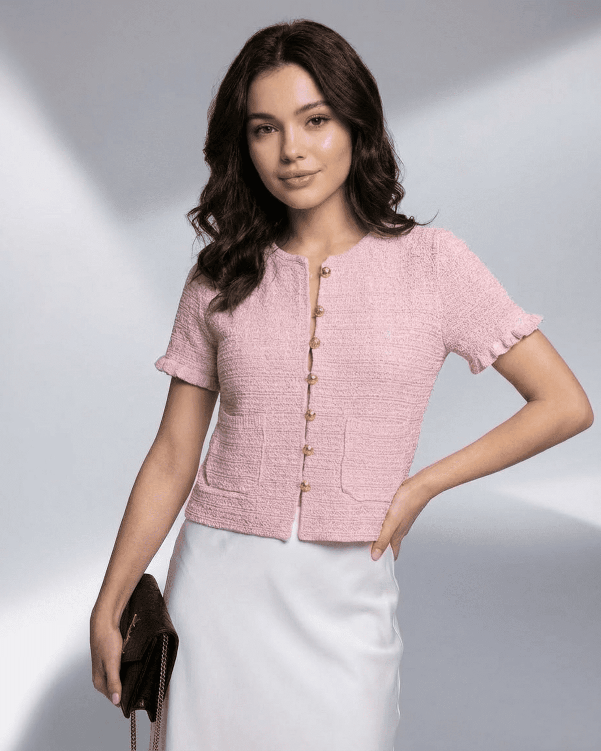 Camellia Cardigan by Lauven, a short sleeve buttoned knit with O-neck, perfect for warm-weather styling.