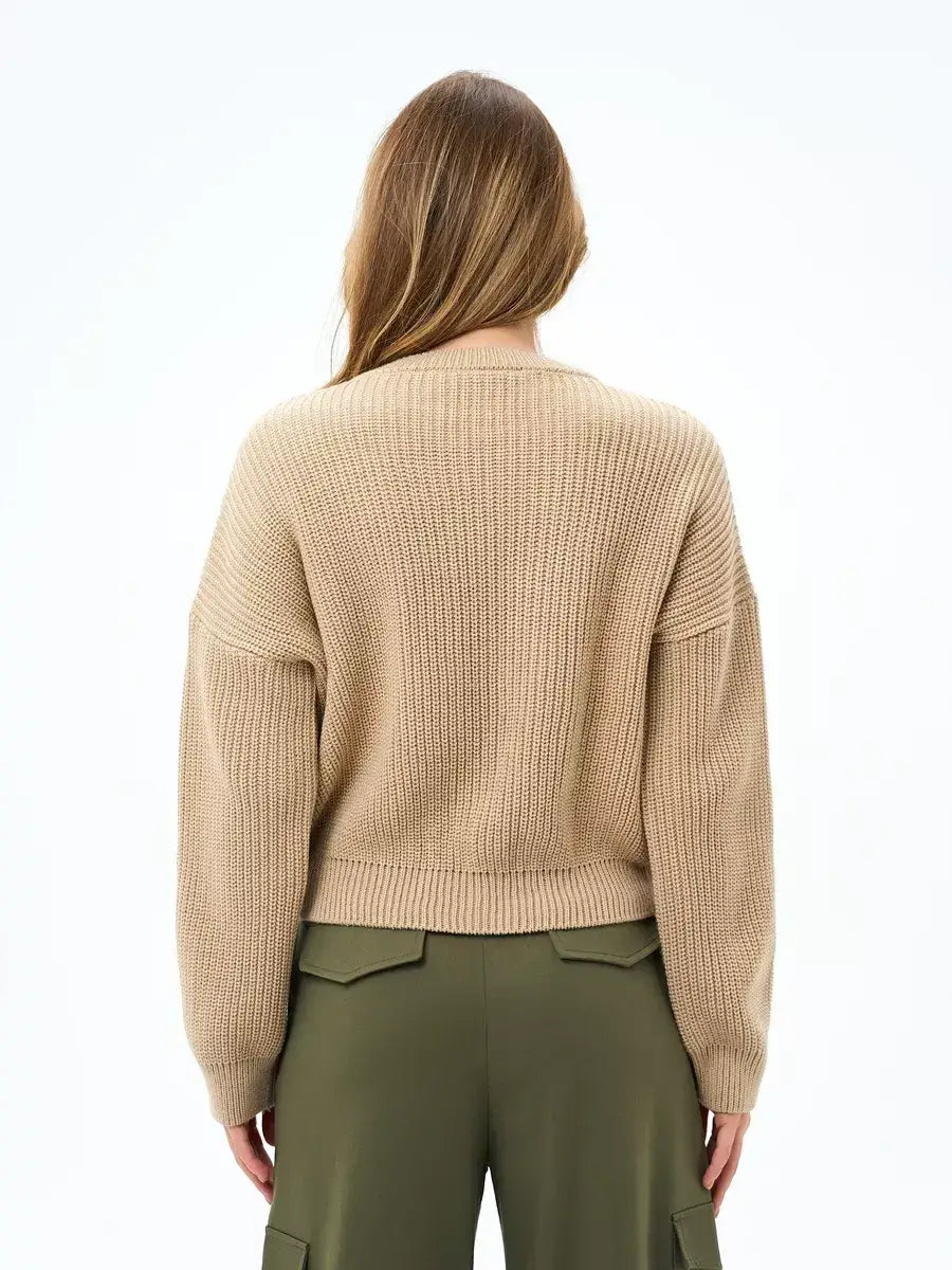 Cappuccino Sweater by Lauven, oversized knit in warm beige, showcasing the back view for a relaxed, cozy style.