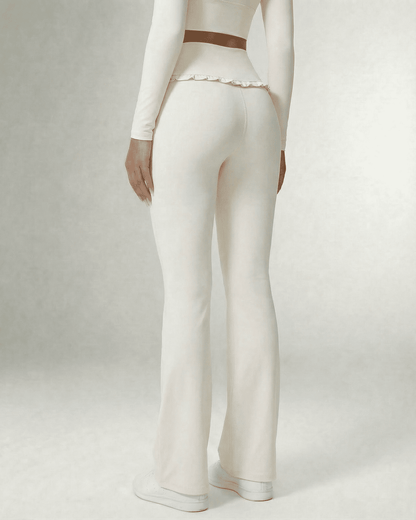 Celeste Leggings by Lauven, elegant white flare pants with pockets and soft, stretchy fabric.