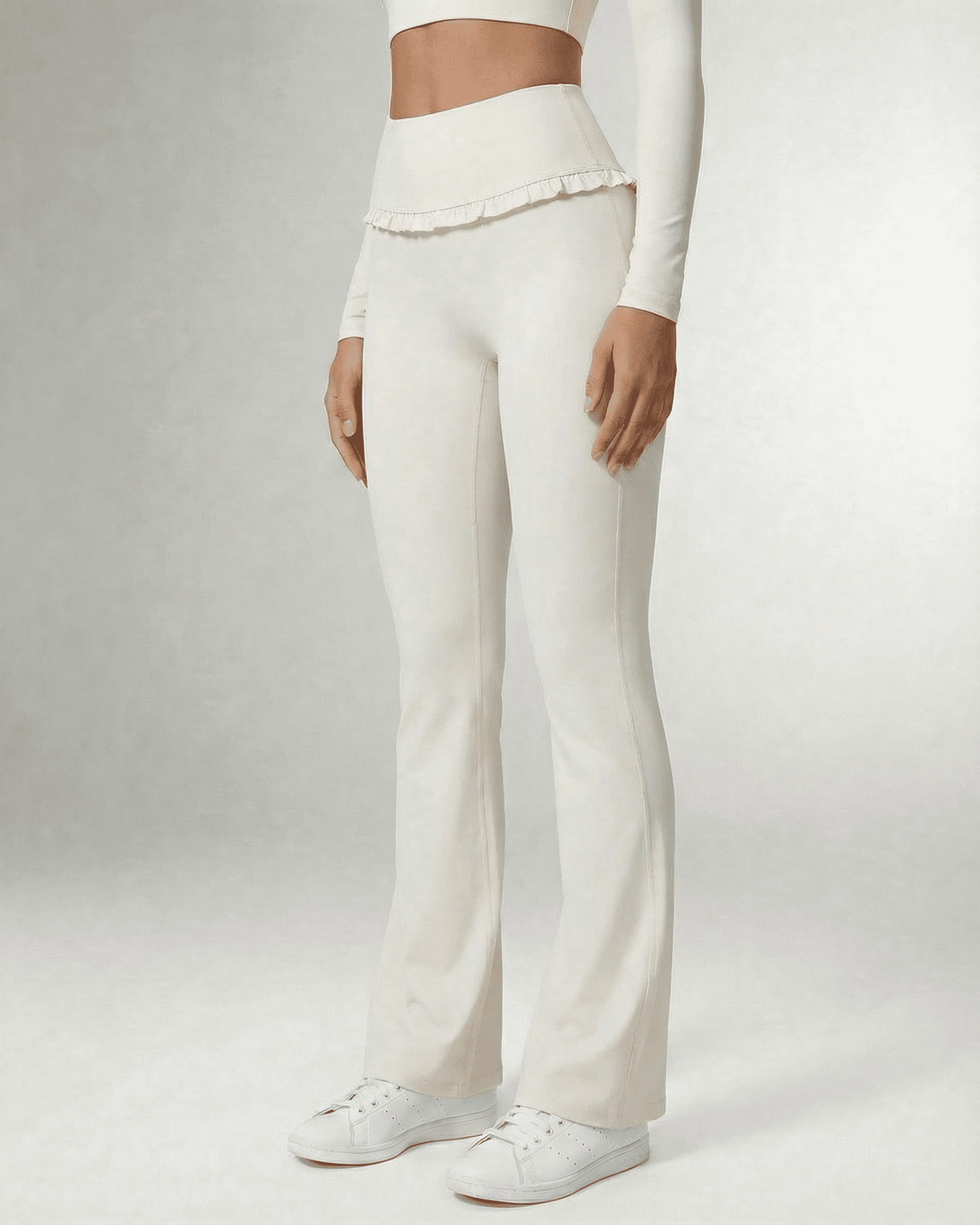 Celeste Leggings by Lauven - Elegant white flare pants with pockets and ruffle detail, perfect for style and comfort.