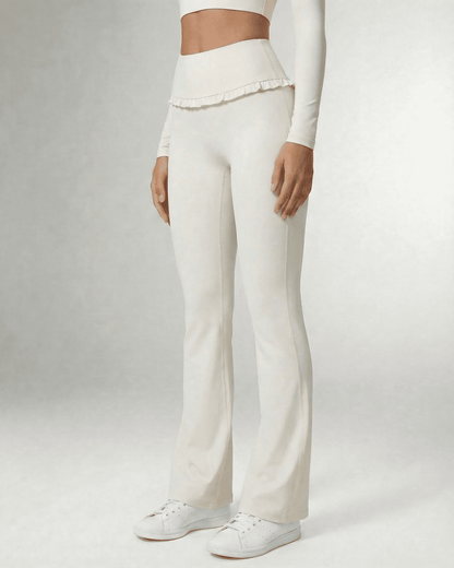 Celeste Leggings by Lauven - Elegant white flare pants with pockets and ruffle detail, perfect for style and comfort.