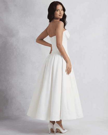 Celeste Midi Dress by Lauven featuring an elegant strapless corset design and A-line cut.