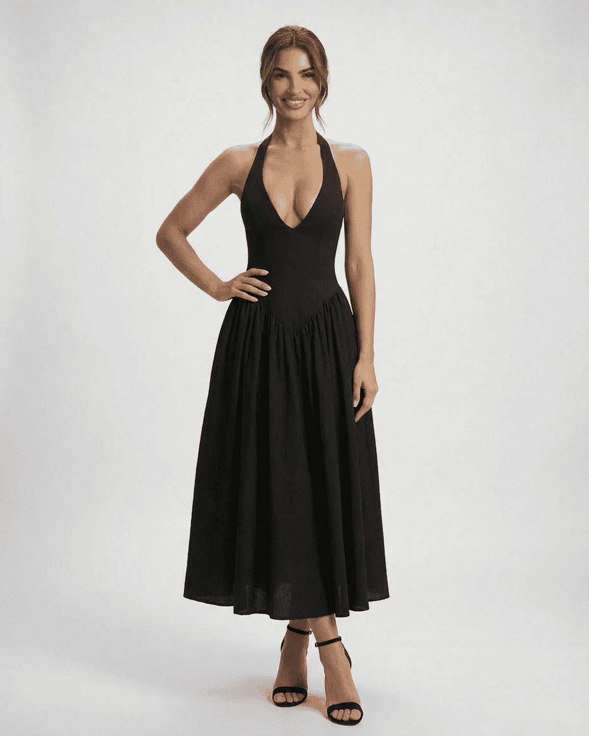 Celeste Midi Dress by Lauven featuring a halter neck and flowing A-line silhouette, perfect for evenings out.