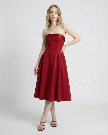 Celeste Midi Dress by Lauven, strapless high-waist silhouette in elegant red with pockets, perfect for special occasions.
