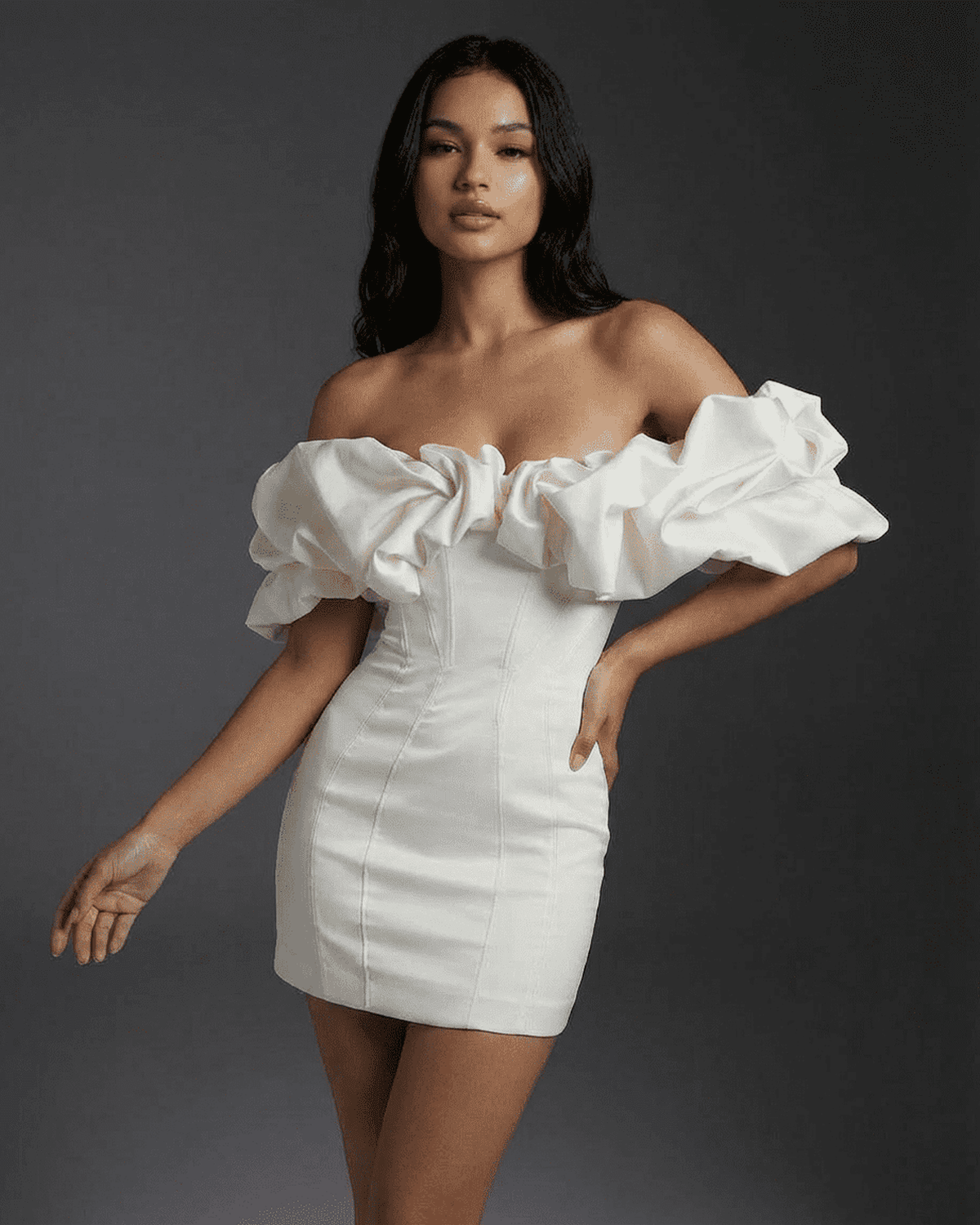 Celeste Mini Dress by Lauven featuring dramatic ruffle trim and boned structure for a sleek look.